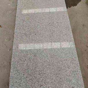 防城港芝麻白光面毛板